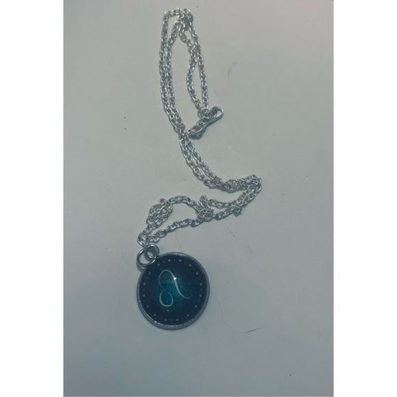 Capricorn green GLOW IN THE DSRK ZODIAC STAR SIGN NECKLACE - Picture 6 of 14